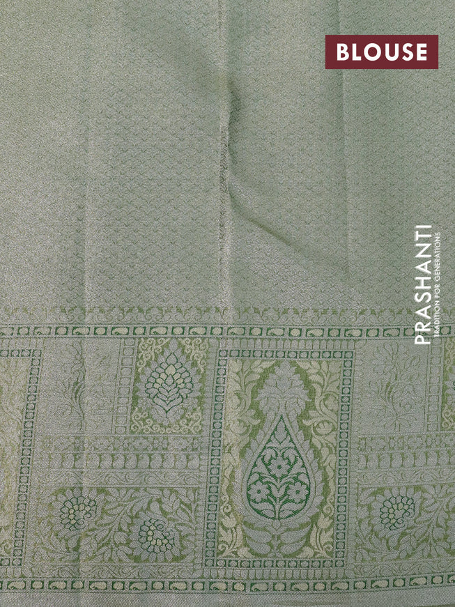 Tissue semi kanjivaram silk saree pastel green and green with allover silver zari woven broacde weaves and silver zari woven border
