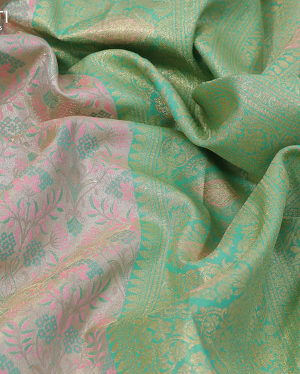 Tissue semi kanjivaram silk saree cream teal shade and teal green shade with allover thread & zari woven floral weaves and rich zari woven border