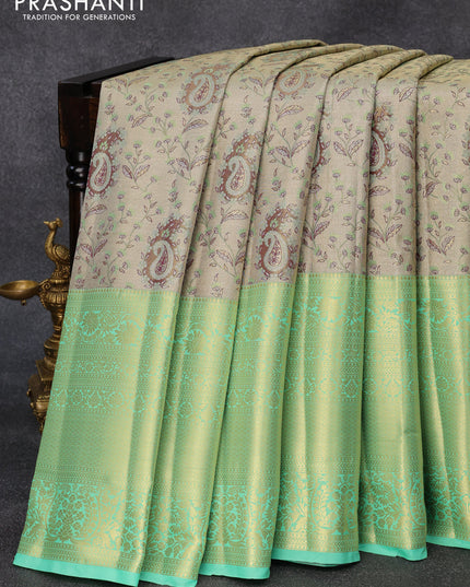 Tissue semi kanjivaram silk saree grey shade and teal green with allover thread & zari woven paisley weaves and long zari woven border