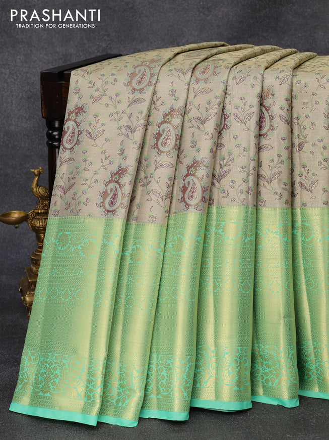Tissue semi kanjivaram silk saree grey shade and teal green with allover thread & zari woven paisley weaves and long zari woven border