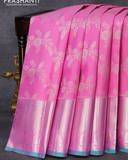 Pure kanjivaram silk saree light pink and teal green with allover silver zari weaves and silver zari woven border