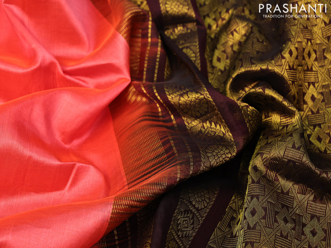 Kuppadam silk cotton saree dual shade of pinkish orange and coffee brown with plain body and zari woven border