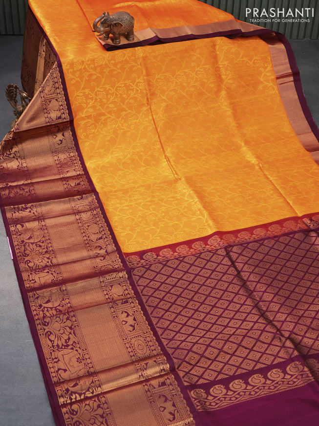 Kuppadam silk cotton saree mango yellow and wine shade with allover self emboss and long zari woven border