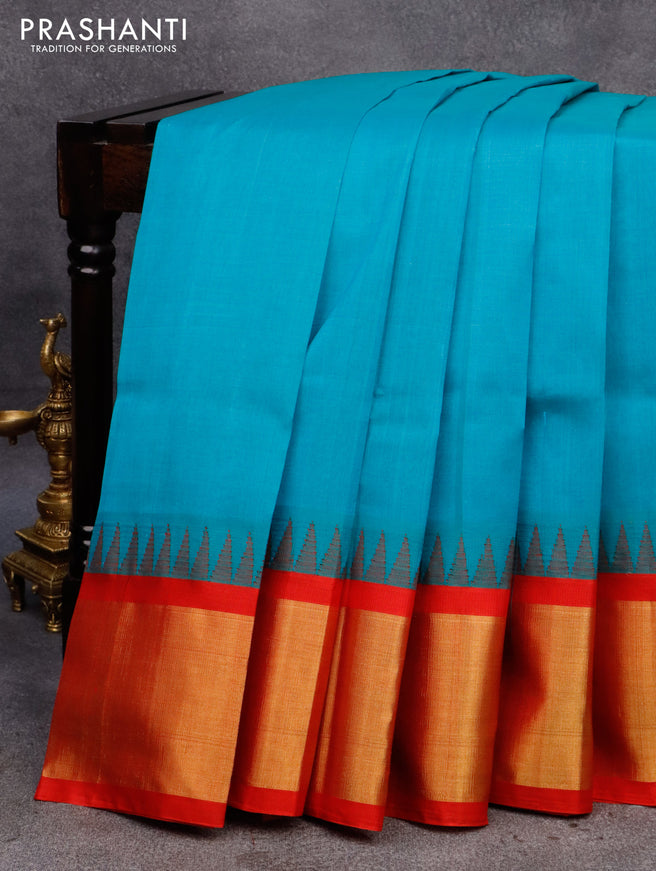 Kuppadam silk cotton saree teal blue and red with plain body and temple design zari woven border