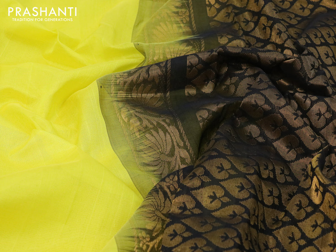 Kuppadam silk cotton saree lime yellow and black with plain body and temple design zari woven border