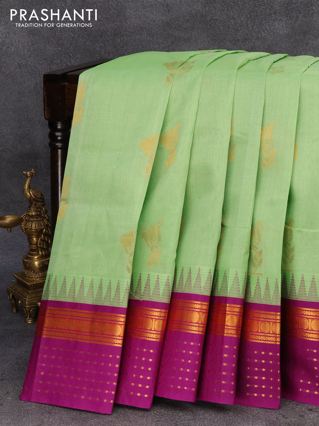 Kuppadam silk cotton saree pista green and purple with floral zari woven buttas and temple design rudhraksha zari woven border