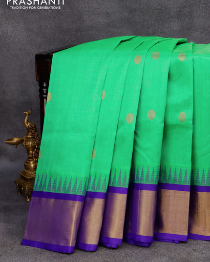 Kuppadam silk cotton saree teal green and blue with rudhraksha zari woven buttas and temple design zari woven border