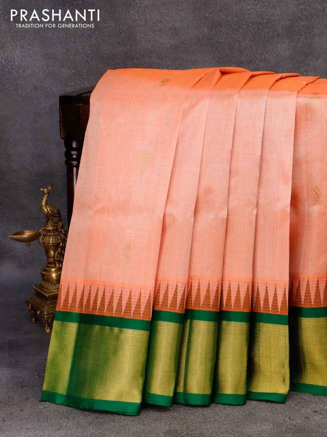Kuppadam silk cotton saree peach orage and green with zari woven floral buttas and temple design long zari woven border