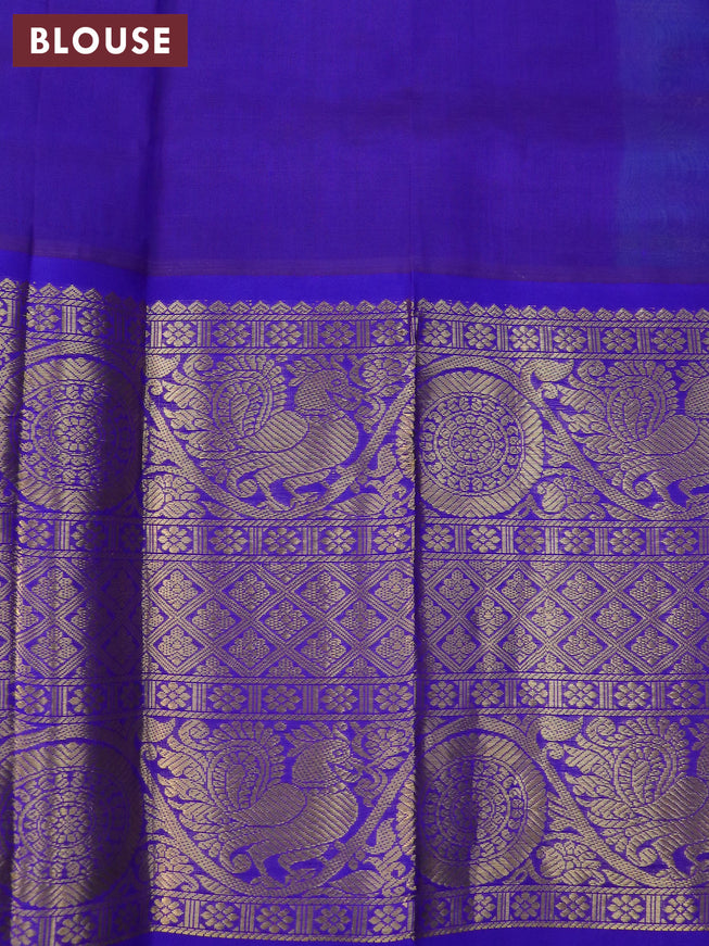 Kuppadam silk cotton saree teal blue and blue with allover zari woven stripes pattern and long zari woven border