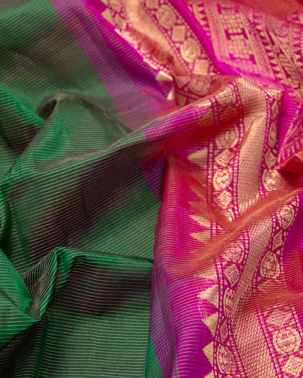 Silk cotton saree green and pink with allover vairosi pattern and temple zari woven korvai border