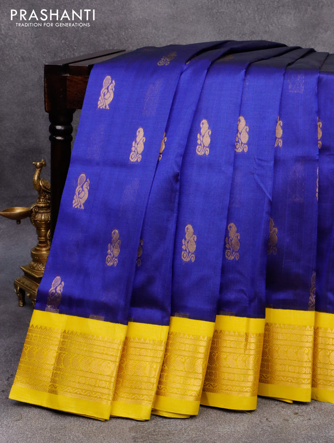 Silk cotton saree blue and yellow with annam zari woven buttas and zari woven korvai border