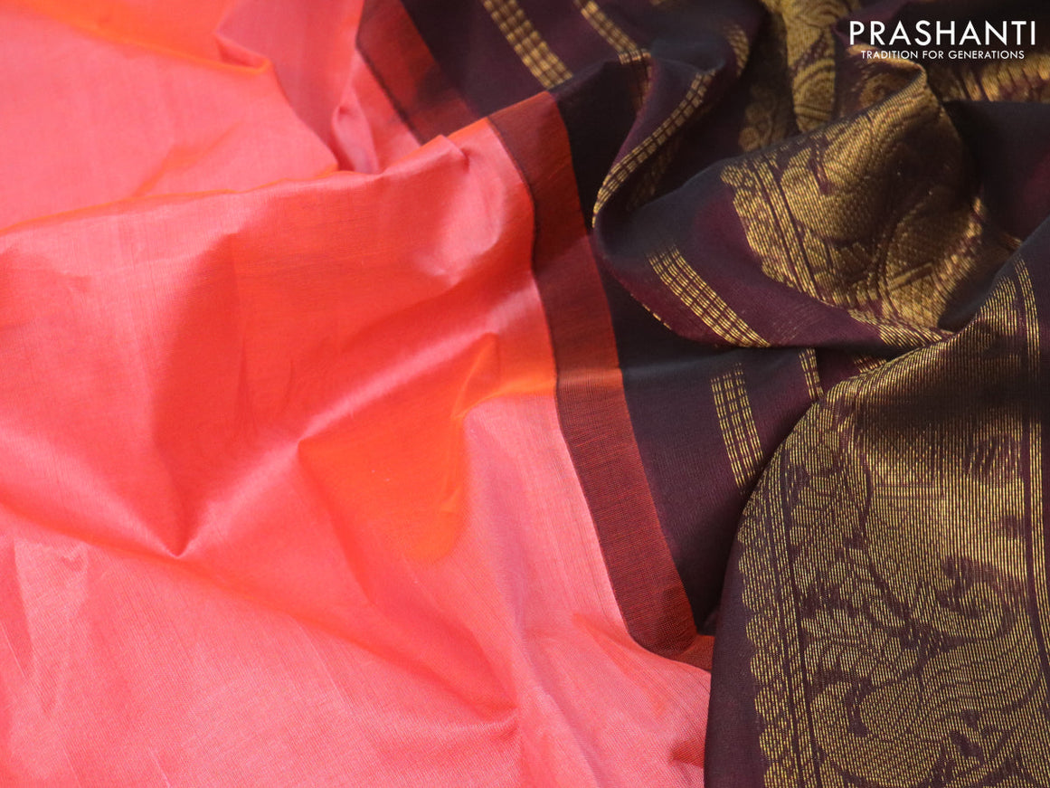 Silk cotton saree peach pinkish orange and deep wine shade with plain body and zari woven korvai border