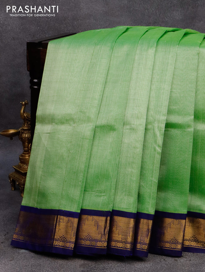 Silk cotton saree light green and blue with allover vairosi pattern and temple zari woven korvai border