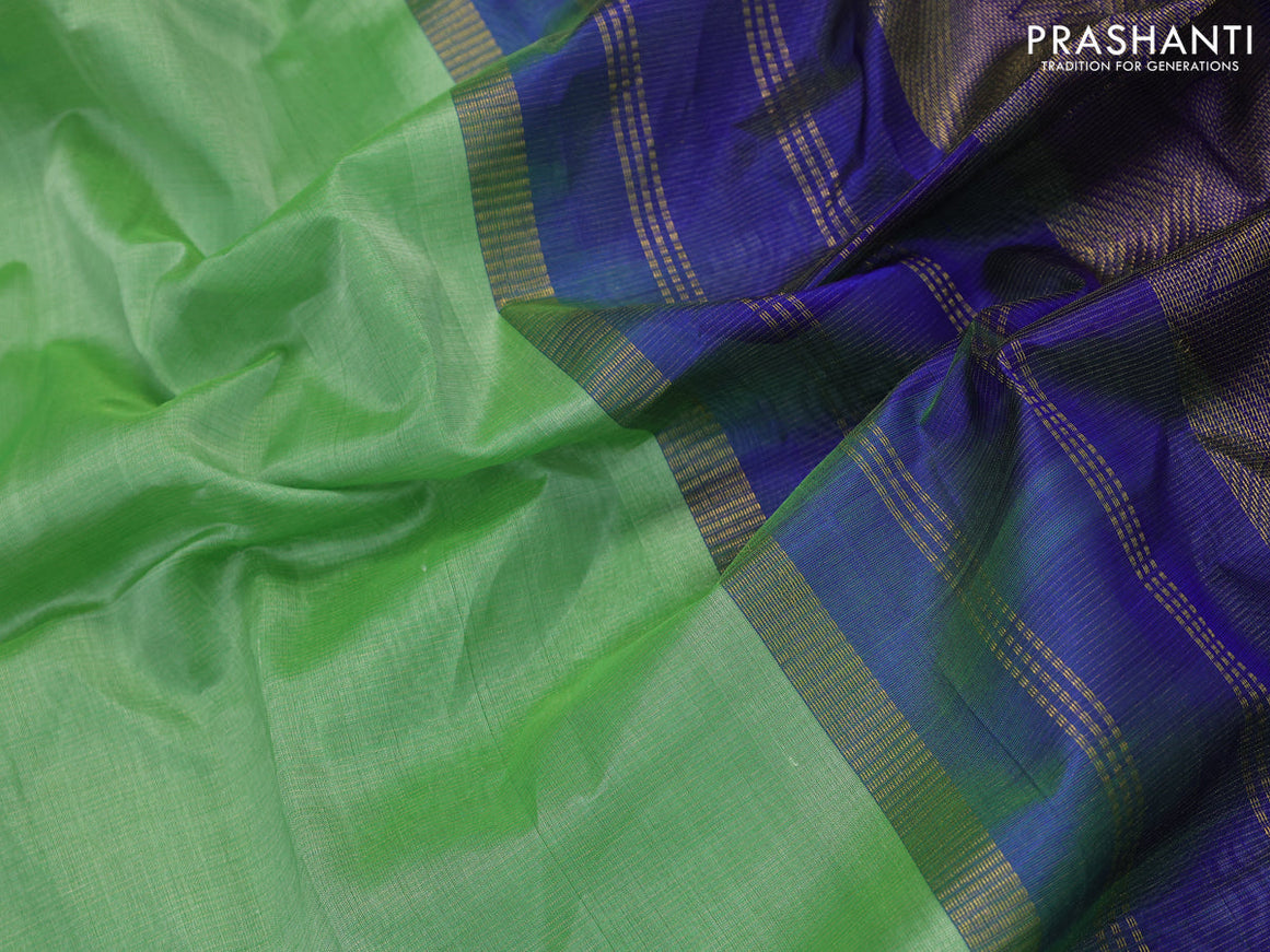 Silk cotton saree light green and blue with allover vairosi pattern and temple zari woven korvai border