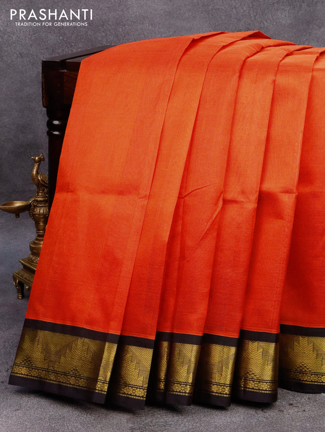 Silk cotton saree orange and black with allover vairosi pattern and temple zari woven korvai border