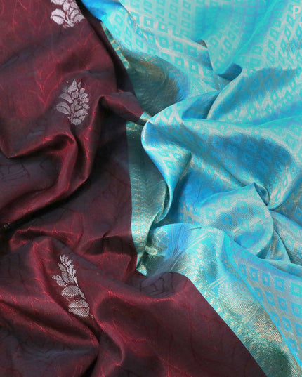 Silk cotton saree deep maroon and cs blue with allover self emboss & zari woven buttas and rettapet zari woven korvai border