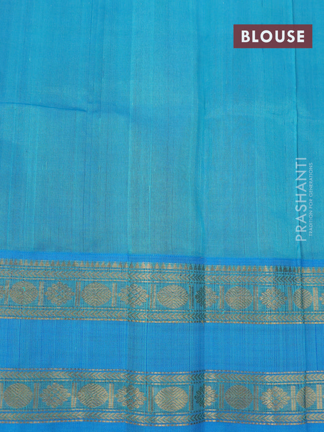 Silk cotton saree deep maroon and cs blue with allover self emboss & zari woven buttas and rettapet zari woven korvai border