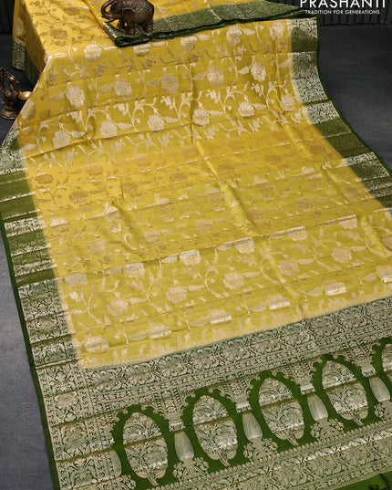 Chiniya silk saree yellow and green with allover zari woven floral weaves and floral zari woven border