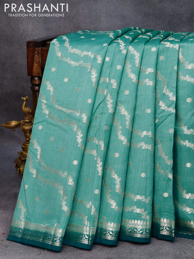 Chiniya silk saree pastel blue and peacock green with allover zari weaves and small zari woven border
