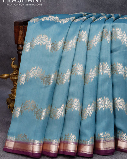 Chiniya silk saree bluish grey and purple with allover zari weaves and small zari woven border