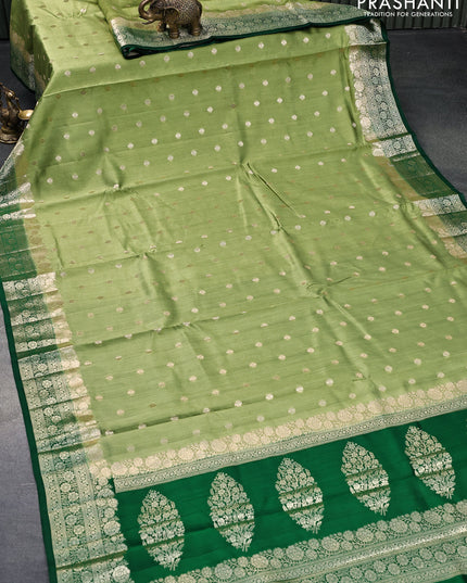 Chiniya silk saree light green and green with zari woven buttas and floral design zari woven border