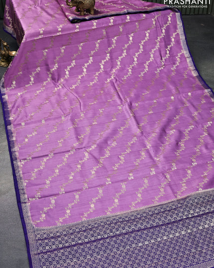 Chiniya silk saree mild purple and blue with allover zari weaves and small zari woven border