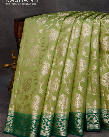 Chiniya silk saree pastel green and green with allover zari weaves and zari woven border