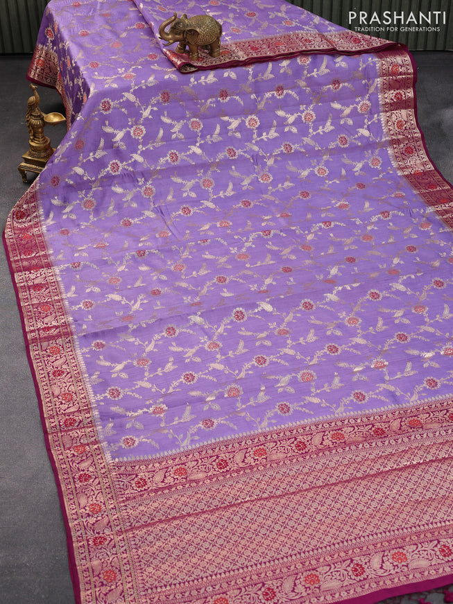 Chiniya silk saree lavender shade and purple with allover floral zari weaves and zari woven border