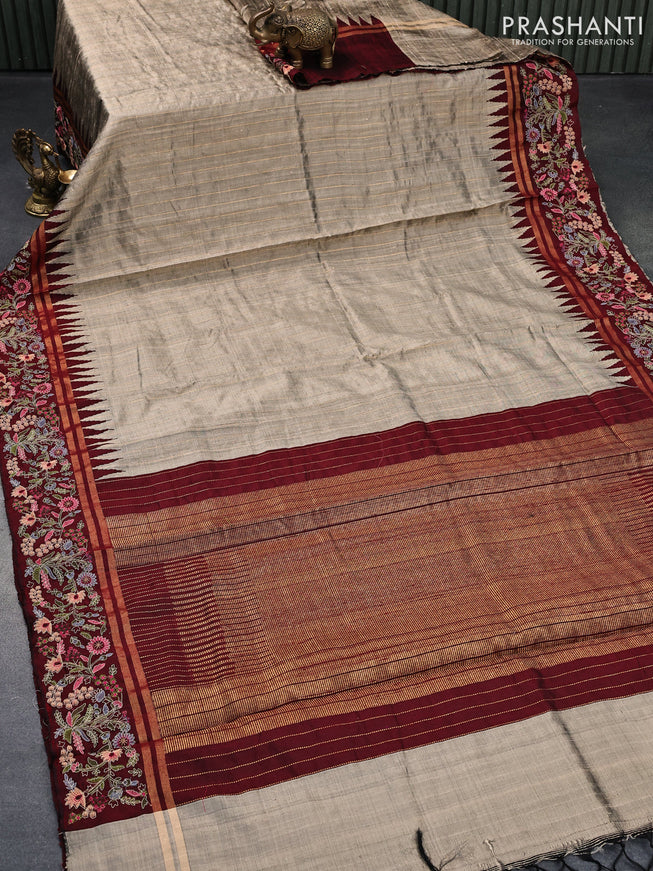 Pure dupion silk saree beige and maroon with allover zari weaves and temple woven floral design embroidery work border