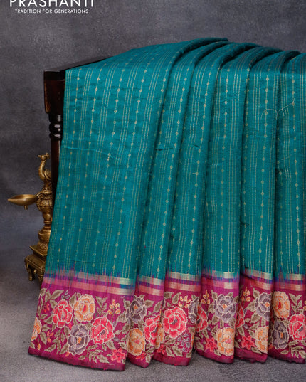 Pure dupion silk saree peacock green and purple with allover zari weaves and floral design embroidery work border