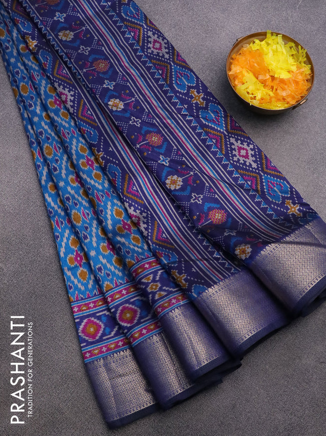 Semi tussar saree cs blue and dark blue with allover ikat prints and zari woven border