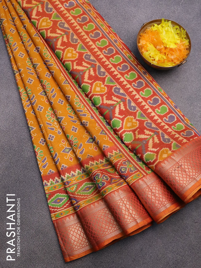 Semi tussar saree mustard yellow and rust shade with allover floral prints and zari woven border