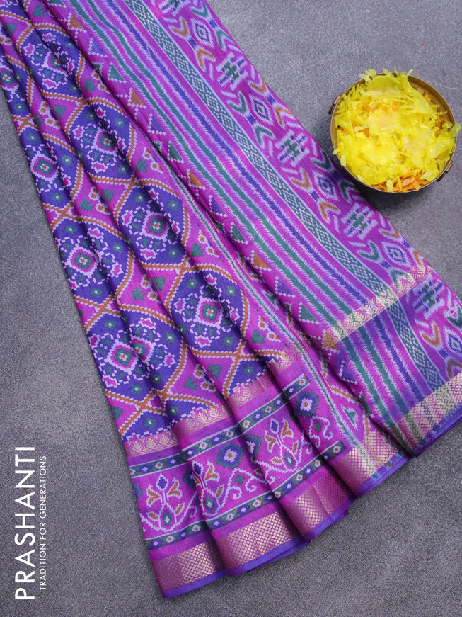 Semi tussar saree blue and purple with allover ikat prints and rettapet zari woven border
