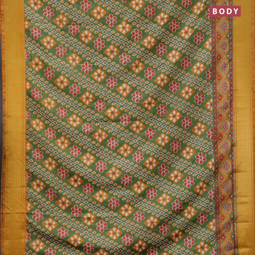 Semi tussar saree green and mustard yellow with allover ikat prints and zari woven border