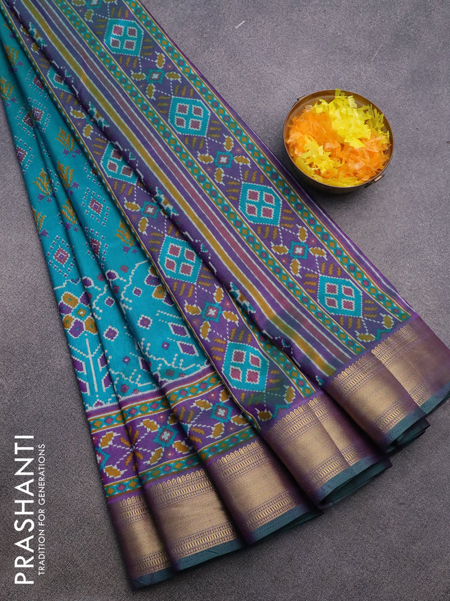 Semi tussar saree teal green and dual shade of purple with allover butta prints and zari woven border