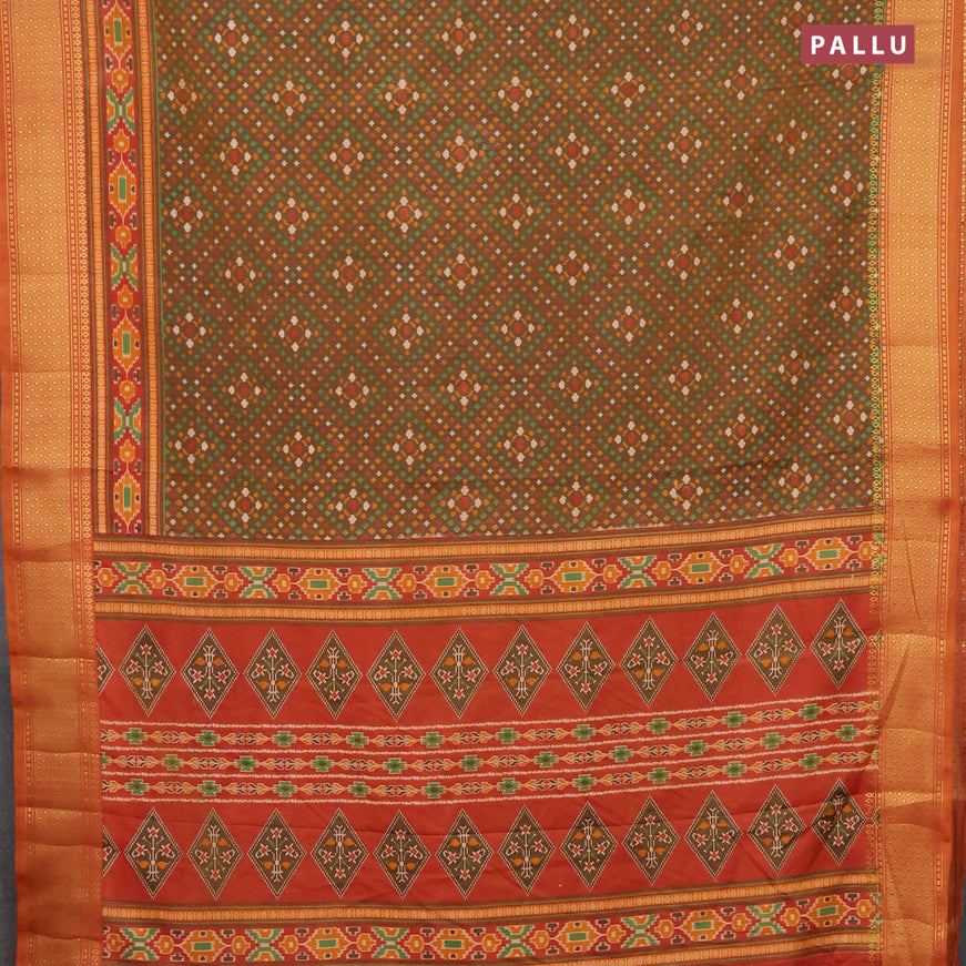 Semi tussar saree brown shade and pale orange with allover prints and zari woven border