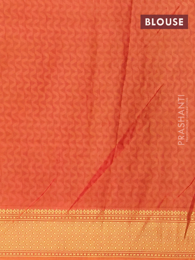 Semi tussar saree brown shade and pale orange with allover prints and zari woven border