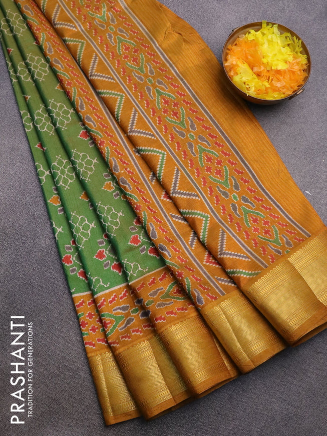 Semi tussar saree light green and mustard shade with allover butta prints and zari woven border