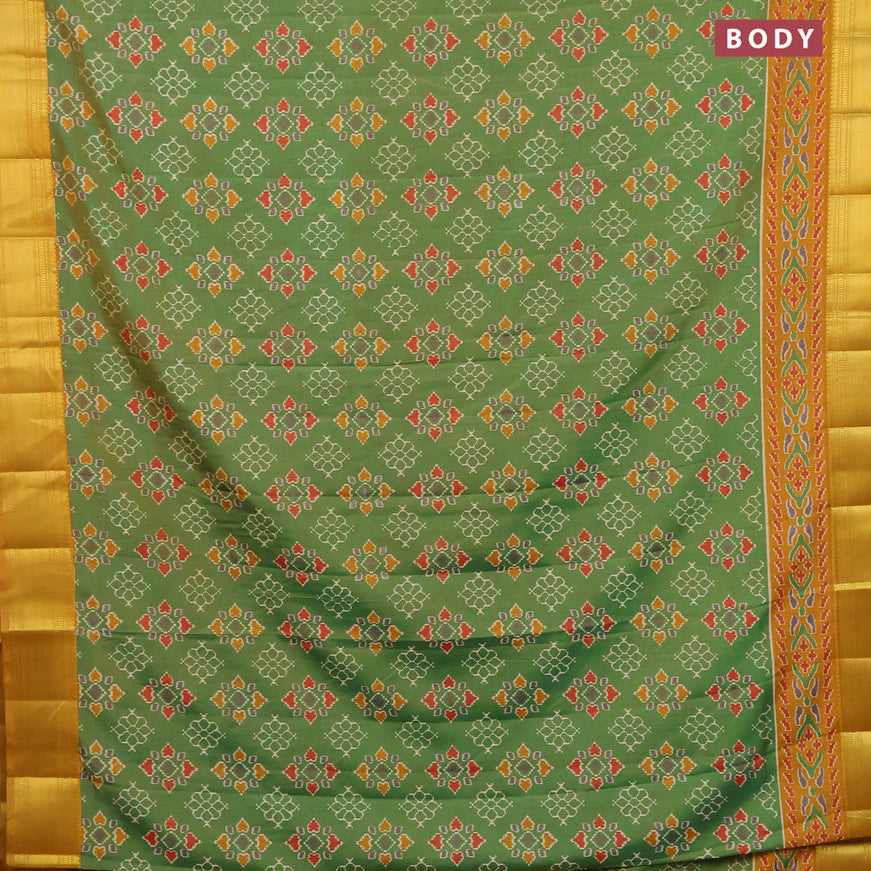Semi tussar saree light green and mustard shade with allover butta prints and zari woven border