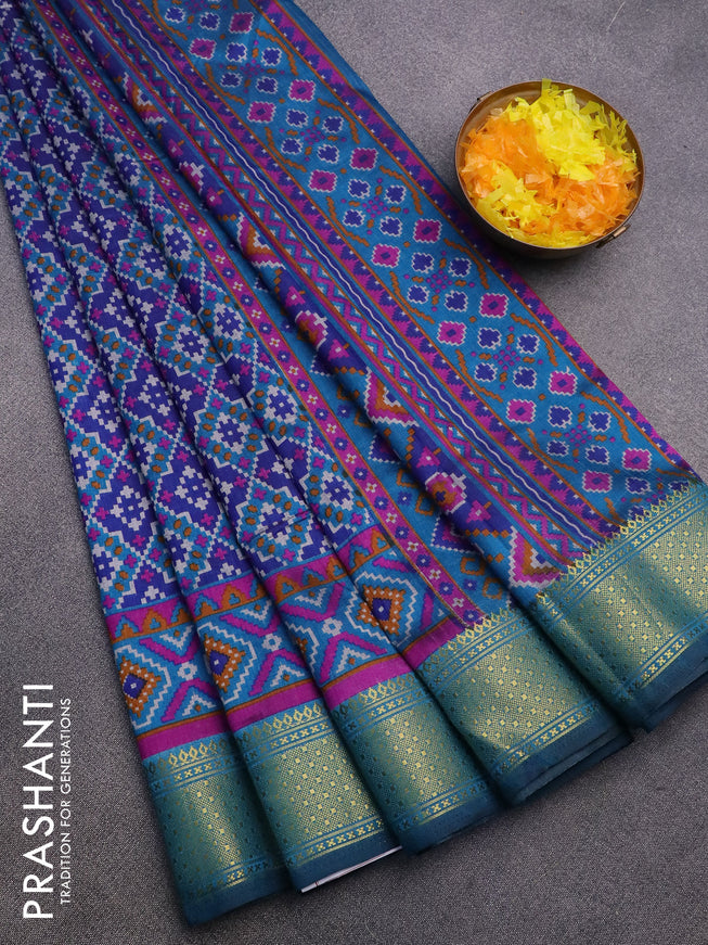 Semi tussar saree blue and cs blue with allover ikat prints and zari woven border