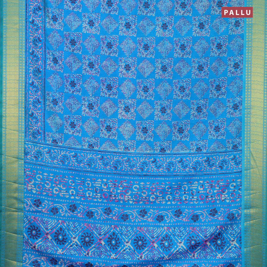 Semi tussar saree teal blue and green with allover ikat prints and zari woven border