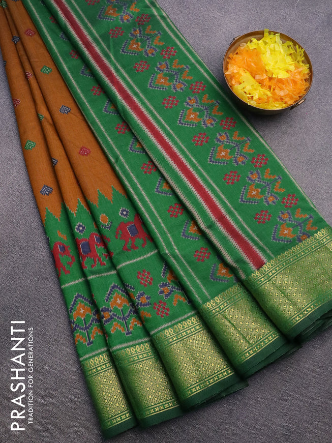 Semi tussar saree dark mustard and green with allover ikat butta prints and zari woven border