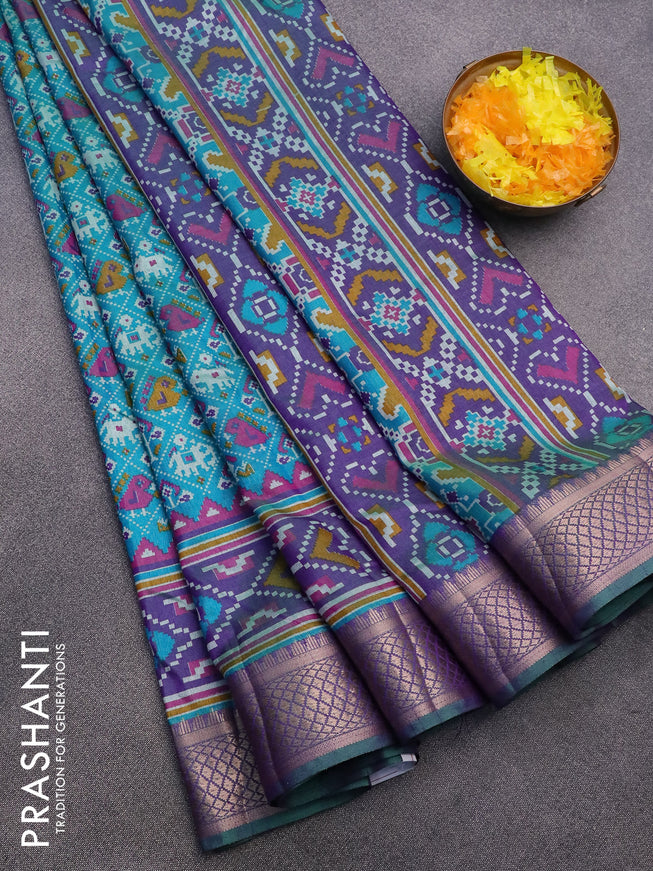 Semi tussar saree teal blue shade and dual shade of violet with allover patola prints and zari woven border