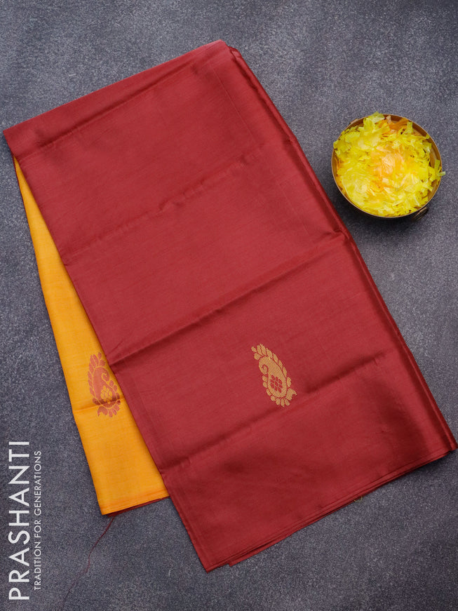 Banana pith saree maroon and mango yellow with thread woven buttas in borderless style