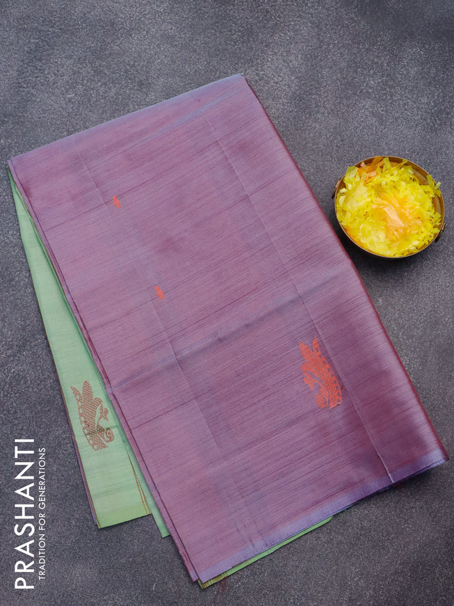 Banana pith saree dual shade of maroonish lavender and pastel green with thread woven buttas in borderless style