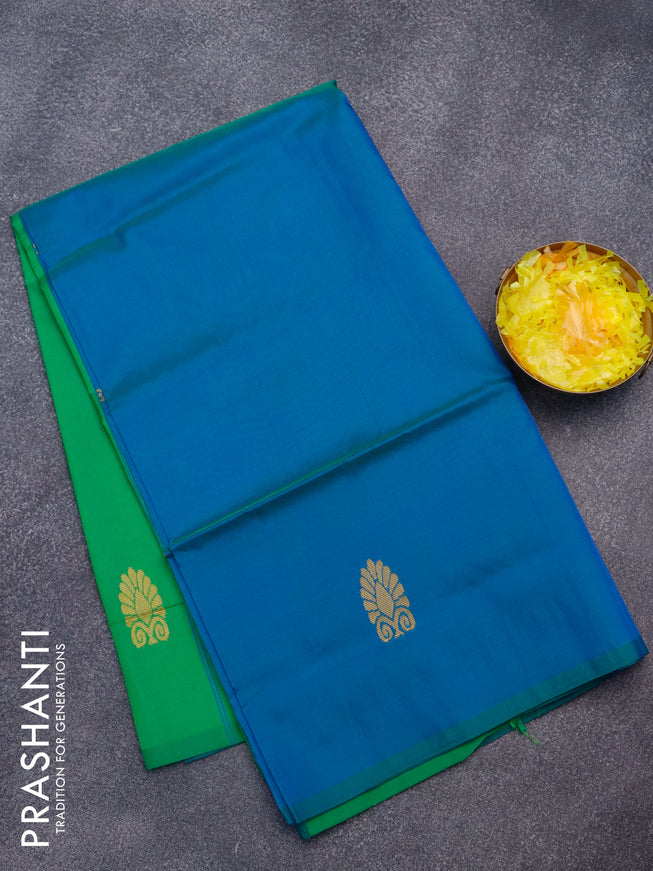 Banana pith saree peacock blue and parrot green with thread woven buttas in borderless style