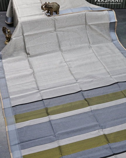 Maheshwari silk cotton saree grey shade and grey with allover stripes pattern and thread woven border