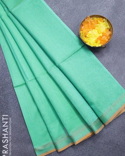 Maheshwari silk cotton saree dual shade of teal green and mustard yellow with plain body and thread woven border