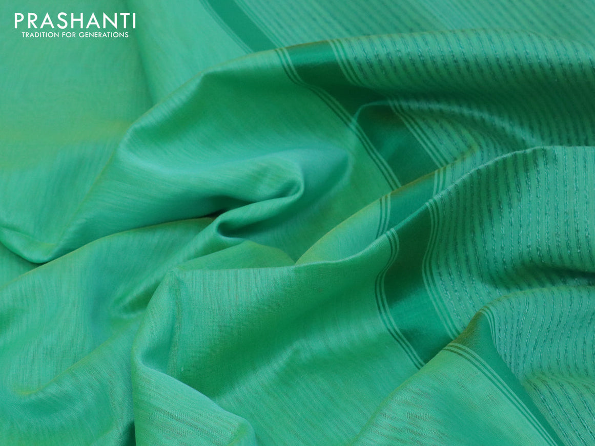 Maheshwari silk cotton saree dual shade of teal green and mustard yellow with plain body and thread woven border