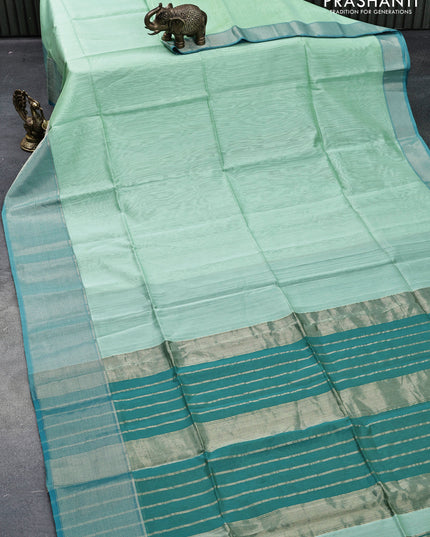 Maheshwari silk cotton saree pastel green and peacock blue with plain body and zari woven border